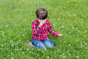 little girl on the grass