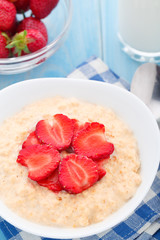 Oatmeal breakfast with strawberries