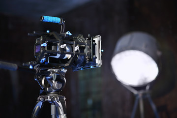 Camera with special header for shooting video on tripod