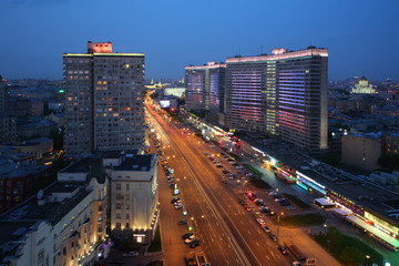 Fototapeta na wymiar New Arbat Street and towers of Kremlin at night