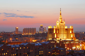 Fototapeta na wymiar Building of Hotel Ukraine with beautiful illumination at evening