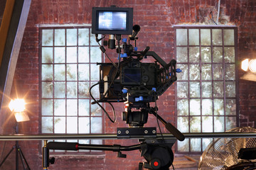 Camera with special devices for shooting video on rail in studio