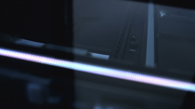 Flat bed computer scanner in action.