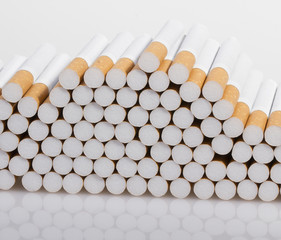 stack of cigarettes on a white background