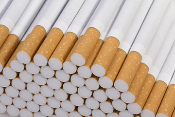 stack of cigarettes on a white background