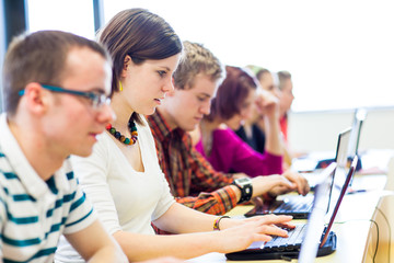 Group of college/university students in in a classroom