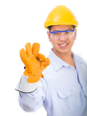 Engineer in the construction helmet with OK hand