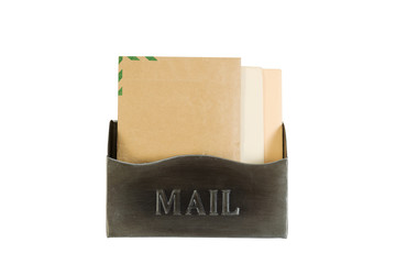 Old Metal Mailbox filled with Envelopes on White