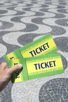 Hand Holding Brazil Tickets Copacabana Rio de Janeiro