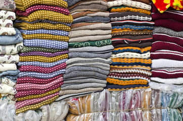 Colorful stacked fabric in  big market , India