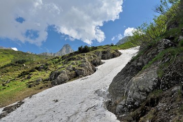 Summer snow over the mountains