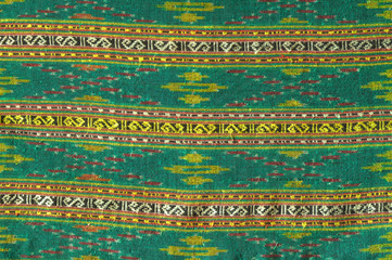 Hand-woven cotton cloth in traditional Thai pattern