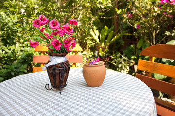 able and chairs in garden