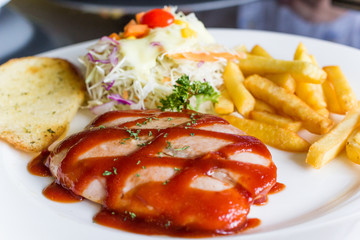 Sausage pork steak with salad and fried potatoes