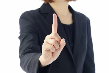 人差し指を立てるビジネスウーマン