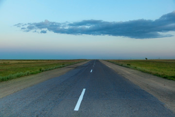 road in the desert at dusk, beautiful landscape