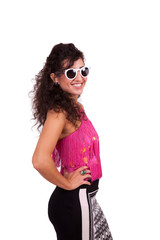 Happy young woman wearing sunglasses and posing