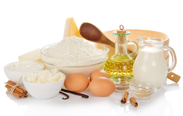 Fototapeta na wymiar Sieve, spoon and set of ingredients for baking