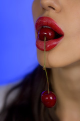 Woman's mouth with red cherries (Sexy red Lips with Cherries)