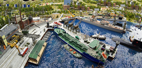 Ships and a submarine in dry dock at the naval base