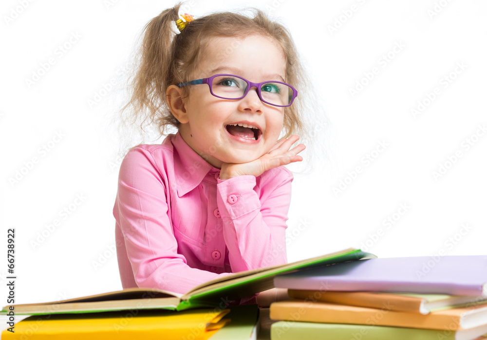 Wall mural funny kid girl in glasses reading books