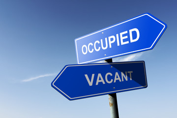 Occupied and Vacant directions.  Opposite traffic sign.