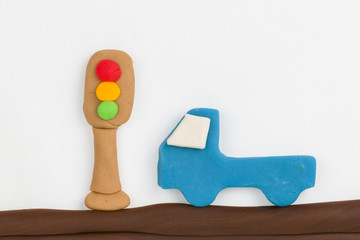 Plasticine traffic light and car.