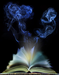 abstract of  open book page with moving smoke on black backgroun