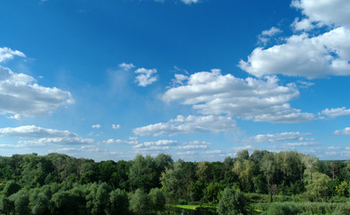 Fototapeta premium Summer landscape and cloudy sky