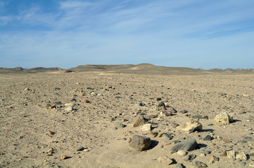 Fototapeta na wymiar Stone and sandy Egyptian desert.