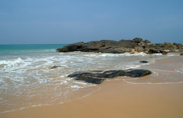 Stones on the idyllic beach in Sri Lanka.