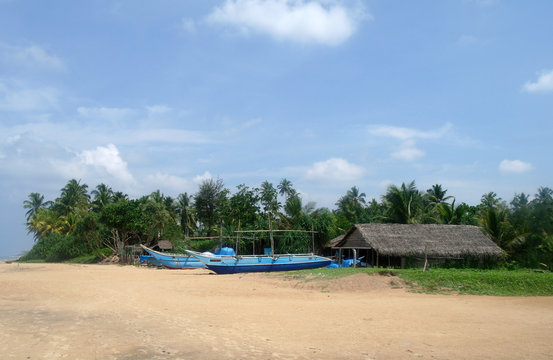 Exotic fisherman boat on beach near the ocean