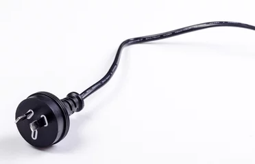 Fototapeten A black Australian power cord plug on white background © trappy76