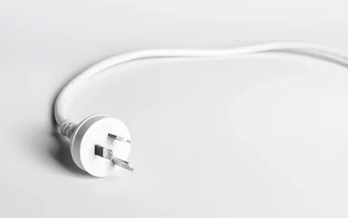  A white Australian power cord plug on white background © trappy76