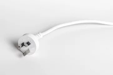 Fototapeten A white Australian power cord plug on white background © trappy76
