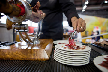 Serving acorn-fed Iberian ham