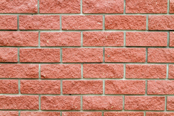 Obraz premium Brick wall of pink stone