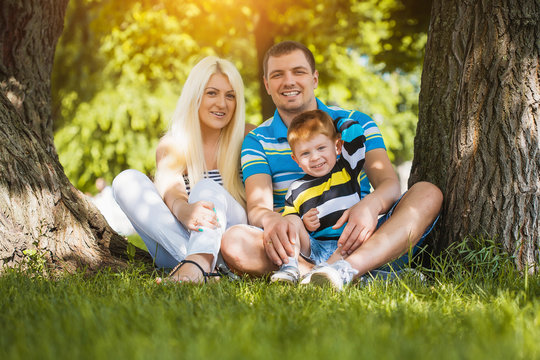 Happy family in the summer park