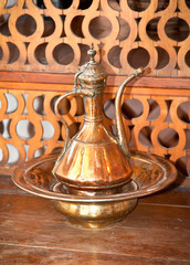 Fototapeta na wymiar Typical vintage metal teapots in Gjirokaster.