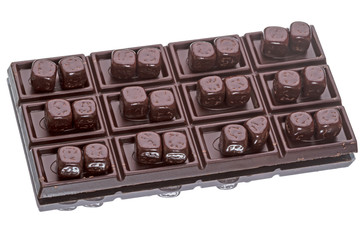 Bar and cubes of chocolate