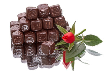 Chocolate cubes and rose