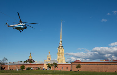 Fototapeta na wymiar St. Petersburg. helicopter soars near Peter and Paul Fortress