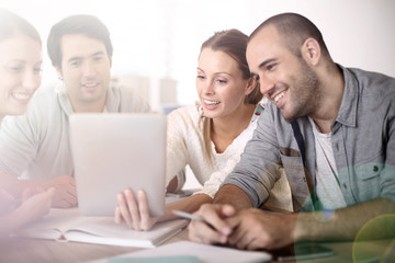Business people working on tablet in office
