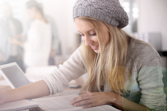 Blond Student Girl Reading School Books For Examination