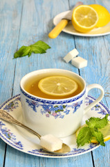 Black tea with lemon and mint.
