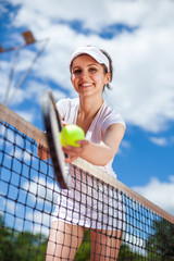 Female playing tennis