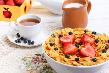 Breakfast - cornflakes with  strawberries and blueberries