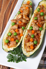 appetizer zucchini stuffed with meat, vegetables and cheese