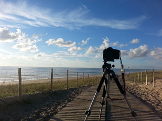 Professional camera taking picture at the beach