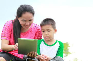 Mother and son using a tablet